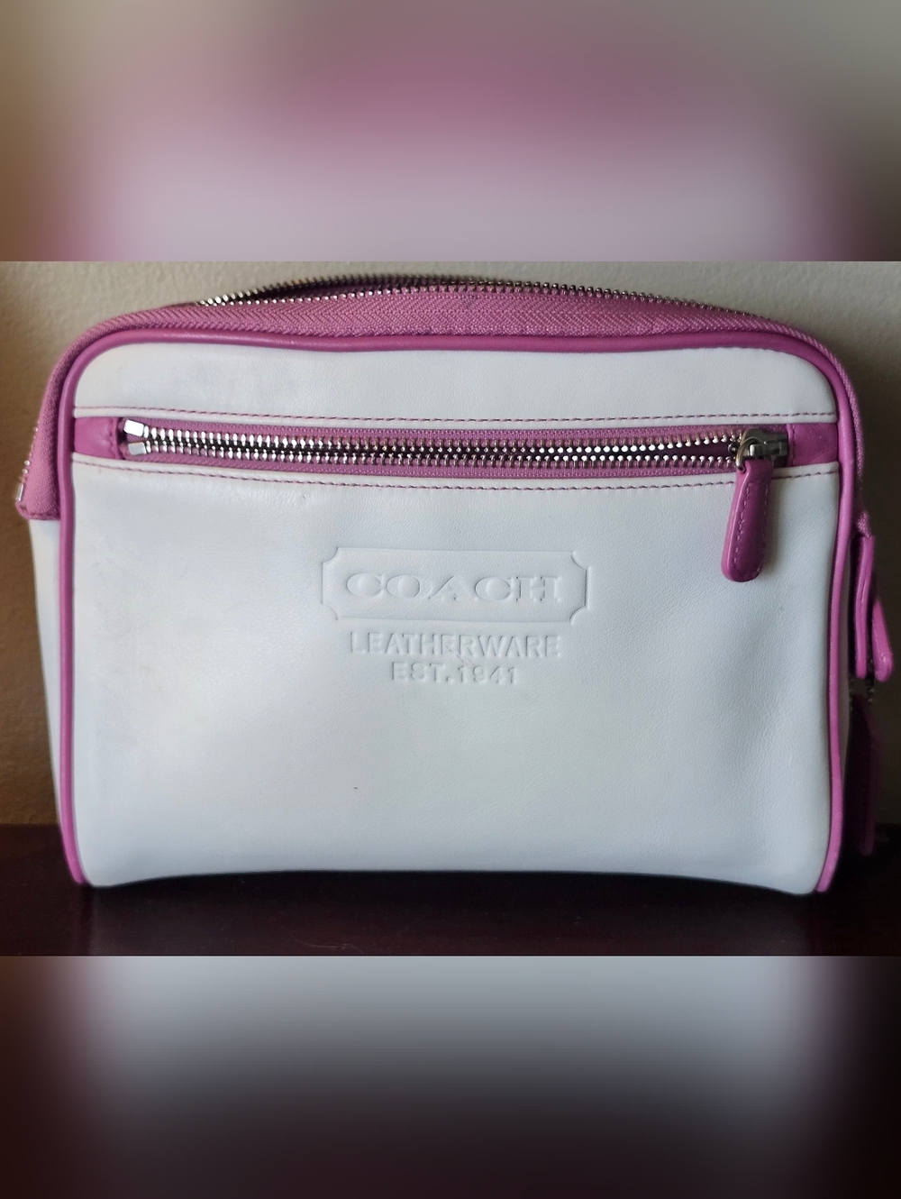 COACH Vintage White Leather Travel Pouch with Pink Trim.